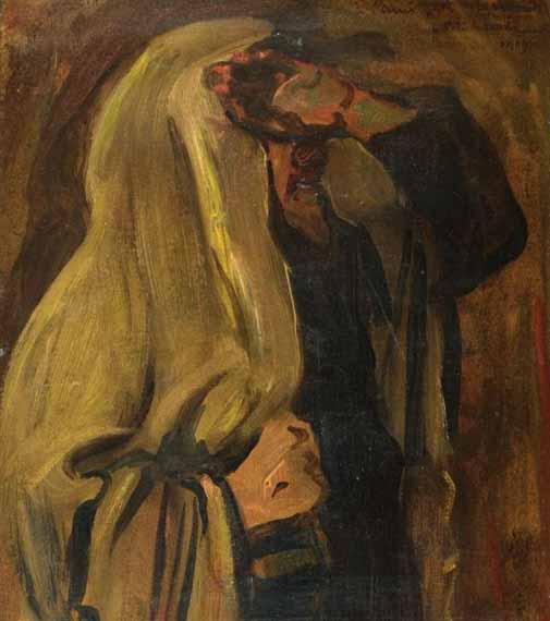 Jewish man wrapped in a prayer shawl